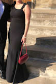 I loved the dress and received many compliments throughout the evening. I wore a flat wedge shoe (1/2" tall) and had to have apx 1.5" hemmed. - Nicole S.