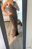 Great dress I wore it to a wedding I'm short but curvy I felt the dress was flattering. I got compliments. - Hannah E.