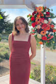 Overall loved it! The fit was great; slightly tight around the waist/ribs, but not enough that I would have sized up. It was flattering and comfortable for an all-day event. The color is definitely more red than I expected, more like a "pomegranate" than a "rust", but still great. - Charlotte A.