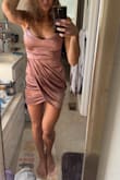 I bought a Small. This is a lightweight fun dress! It is a little short, but definitely hides all the areas aka: my arse was not hanging out (which is hard to find with a dress like this due to my long legs). It is shorter on me than on the model displaying the outfit, but it doesn't look bad or inappropriate. Everywhere else it fits like a glove. I got a lot of compliments on it! - Melissa B.