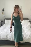 This dress looks great in photos, but the construction is so poor for the price. The material also wrinkles super easily. I steamed it before going to the wedding, but it was super creased just from the car ride to the venue. 
Overall, it gets the job done, but I am super unimpressed considering the price. - Ashleigh L.