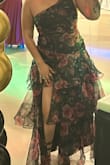 This dress has a "simple" yet "extravagant" look to it, I really enjoyed how fun it was wearing it from the fluff/flow of the bottom and he slit on the leg. I received so many compliments! I am on the wider side, So I enjoyed how this dress snatched my waist and "hid" my bigger features. Highly recommend! - Alejandra O.
