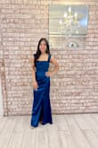Although it was a little tight, it fit like a gem. The color is beautiful and totally worth it for a fancy party. The only alterations I had to do were length-wise wise and I did ask for them to close it up on the leg because it is super high-up cut. Other than that, the perfect dress. - Estrella F.