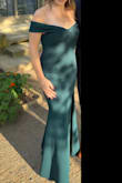 I bought this dress for a fall wedding and the material and color was perfect. It was comfortable to wear. I did need to hem 3" off the bottom or else I was stepping on it. The top part that went over the arms stretched out a little and was falling down a little bit more than I would have liked it to throughout the night. I may have to have it taken in by a seamstress to wear it again. It did get a little snag at some point during the night :-( Overall though I love this dress and am so glad I found it! - Melissa M.