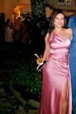 I received so many compliments on this dress. The dress fit perfectly. I ordered a small and it fit nicely on my waist. It was loose fitting on my hips. I would definitely recommend. It's a show-stopper type of dress! - Leslie B.