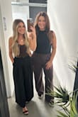 Obsessed with this top, it's so simple yet so stylish. I styled this shirt with a pair of trousers and it was perfect! I'd size up- typically I'm an XS but I got a small! I could maybe even fit into a medium, the bottom is a little corset. - Meghan S.