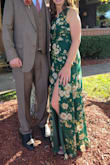This floor length, eye catching dress is fun to wear. It did run long, but was fine with my heels on. - Christin P.