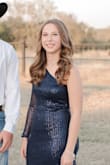 We had to have the top taken in a bit, but overall the dress fit was perfect! This dress is made of quality material and was better than expected! My daughter loved it!! - Kristie M.