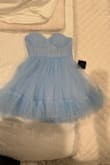 It was a little large in top area. Please just issue store credit. - Cindy W.