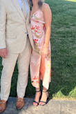 It fit me like a glove! I'm very small chested & the XS was snug enough to not fall off me. Perfect length. Love the sexy leg slit & it's the perfect material for the outdoor summer wedding that I wore it to. Definitely recommend & will be getting others similar! - Kara B.