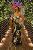 I got so many compliments about my dress! I purchased a Large, but should've ordered a medium as I have a smaller waist to hip ratio. For a smaller chested woman like myself, you'll definitely want to wear some sort of cup to give you a little lift as you can't wear a strapless bra with the back being so low-cut. The straps are also adjustable, which allows you to make the cleavage area as high or low as you want.
Also, keep in mind that the dress is long but beautifully flows as you walk. The slit is the perfect height that gives you a bit of sexy, but not too much. I plan to order a second dress in a Medium size just in case they sell out or discontinue the dress. This is the kind of dress to keep in my closet for a long time. - Simone P.