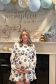 I actually ordered two sizes and kept the large.  I was 27 weeks pregnant on Oct 5th and wore this for my baby shower.  The Medium was too short in the front for my pregnant belly so I went with a large.  Loved this dress.  Got lots of compliments.  Wore it with over the knee boots. - Janelle G.