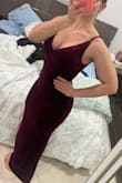 This dress is a gorgeous rich color (true to pictures depending on lighting). The neckline is low but not excessively the way some Lulus dresses tend to be. Straps are thick enough to feel supportive. This dress is very flattering and hugs curves really nicely. It's stretchy and comfortable. I decided it was a little too form fitting/sexy to be appropriate for the occasion for me, but it does create a beautiful silhouette. I thought about sizing up but I think it would be too loose in the bust. I wear a 34DD and the small could accommodate a significantly bigger bust so medium wouldn't work. Something to keep in mind if you have a smaller bust line :) - Annika S.