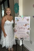 This dress was perfect for my butterfly garden themed bridal shower. I would say the built in cups were a little small for my chest, but I was able to make it work by tying the corset straps tightly so nothing moved. I got so many compliments on this dress!! - Sydney O.