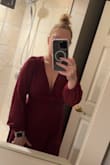 Was worried that I'd need some sort of tape with this dress since the back is open and I couldn't wear a proper bra, but it stayed snug the whole event! Color and material are gorgeous. I wish I would have gotten a full pic while at the wedding because it was just a tad long for me. Even with 3-inch heels, it was dragging a bit. Other than that, it was well worth the money! - Danielle W.