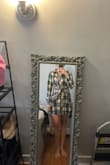 Dress is super cute and comfortable. However, if you are tall it is way too short to wear without anything underneath. I ordered a large thinking it would add some length. - Kelly Q.