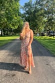 Little low cut but still nice dress for wedding. - Dani D.