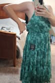 The dress is beautiful.  Fabric is great! It fit ok in the waist and hip, but the bust is easy off. The underarm holes are gigantic! I'm small busted. It definitely didn't fit. - Christine H.