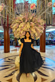 I loved wearing this dress. I truly felt like a princess. As a 5 ft petite woman, the length was perfect for me. I'm glad I read the reviews about the fabric not stretching (true) so I made sure to use the size chart before ordering. The outer fabric scratches my arms a bit but not the worst problem. Overall, the dress is lovely for special events, and I'm glad I bought it. - Marenda E.