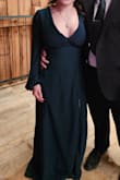 The dress fit wonderful, was slightly big from the waist to my shoulders but easy to fix with some dress tape to hold it in place. Felt expensive and well made; the back was amazing! Definitely would purchase again! - Desiree S.