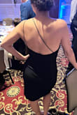 This dress was comfortable and flattering. The front slit & stylish back is everything and sets it apart from your basic black dress. I received many compliments, buy it! - Heather C.