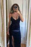 I wore this dress to my sister in law's wedding and got soooo many compliments. It was comfortable and a bit warm which was perfect for a fall wedding. It does run a bit large so I went with XS instead of my usual S. The straps, as some people mention, are very long. I have a relatively large chest, but with a little bit of sewing, I just cut off the excess strap length and sewn it into the back of the dress which was pretty easy. It fit perfectly and kept everything nice and supported. - Maia D.