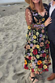 I got many compliments on this dress. It was a bit heavy but actually not too hot. Make sure you give time to wash it before wearing as it had a strong fabric smell. - Haley R.