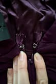 Very disappointed in the quality of the dress; the zipper on the back is cheap looking and the stitching goes all the way past where the 'zipper material' is supposed to stop. Looks terrible, returning immediately. - Kaitlyn E.