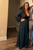 I ordered a few dresses as I was extremely unsure of my size since I'm postpartum with my third kiddo. The fit was great for most or too large (I was in between with their chart measurement-wise), but I went with this one. The shoulder kinda slid down a little but nothing fixing my posture didn't fix. I think it's all in how large your shoulders/chest/ribs are. I am larger in the stomach and hips. I definitely should have had it altered for length a bit or worn heels, but I'm a mom of three who lives in leggings so I didn't make time for that lol. Nonetheless, the large worked well, and the company had a SEAMLESS and SUPER EASY return transaction. Very satisfied and will order again for sure!! - Brittni B.