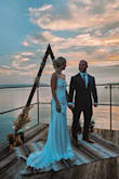This dress fit great and required zero alterations or shapewear. We got married outside at sunrise and took pictures on our boat. With its price point, I didn't feel bad getting it messy in the woods or water. So glad I went with it! - Julia C.
