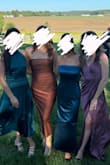 Fit like a glove and was a soft, comfortable material. It has a grip band on the top, but since it was a little big on my chest, it kept sliding down (fashion tape would probably have fixed the issue). The color was also a little more copper than orange in person. - Jillian R.