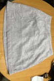I really wanted to like this skirt. It's not truly corduroy; it just looks like cords. It's low quality fabric and the "slip" underneath the skirt stuck to my tights and was showing at the bottom. It's just too low of quality for the price of the skirt. - Corynn T.
