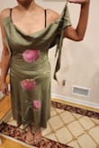 This dress's cut was way off. I'm not sure how to make of this. Enclosed are some photos - Maltie K.