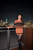 I ordered my normal size (M) and it fit great. The material is stretchy, thick, and comfortable. Great quality! Perfect dress for fall season. - Celeste M.