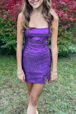 After ordering another dress from your website which ended up being too large, my daughter chose this stunning purple dress. I love that it was just enough coverage to be classy. In my humble opinion, I think she looks better than the model on your website. - Karen R.