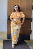 I love these pants, but they were a bit too long and I have to get them tailored. Other than that, I love this two piece set. Perfect for summer celebration - Yeni G.