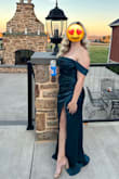 This dress fit like a glove, and looked so beautiful. The slit is a little high, but it's still worth a buy. - Nikki T.