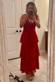 It's a beautiful dress, and it fits true to size. - Vanessa P.