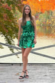 Beautiful dress, perfect for homecoming and not too short or too revealing. My daughter is 5'3 and 120 pounds, and she wore a size small. - Laura W.