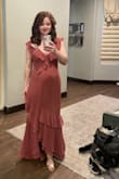 I wasn't sure what measurements to put bc I am 20 weeks pregnant, but this dress saved my butt. I am usually a Small (34B, 125lbs, 27 waist) but since hitting 19 weeks, I sized up one. Aside from needing to shorten the straps (which prob raised the waist an inch) and wear heels, this was great. Could have used hemming, but I didn't make time. I would call it bump friendly prob for another couple of weeks which is pretty good! I am tempted to buy it in my regular size to have on hand! - Marlane B.