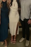 Flattering and classy. Slit is a little high, which made sitting somewhat difficult. But, this dress is the perfect amount of elegant with a touch of sexy! - McKenzie L.