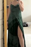 I'm not sure if I hit a misprint, but the slit appears to be in the middle. The color and material is nice - Madison D.