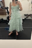 True to size. Just as pictured! Very comfortable and flattering - Casey M.