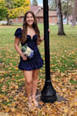 It is so cute and flattering at the same time. It has the perfect shape of being more fitted but still loose. I love the floral pattern on the dress! The back is also so cute! The only thing is that the stings on the back to tie up the dress are kinda long, but otherwise, I love the dress so much! - Klair T.