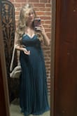 I ordered two dresses from LuLus in an attempt to find a dress for a wedding I was attending. When this dress arrived, it was beautiful - the color was as shown in the pictures, and it appeared crisp in the textured skirt. My only complaint was the zipper; it would get caught where the top of the dress connected to the skirt - due to the textural change. So I had to pull the dress over my head already zipped to avoid struggling with the zipper the day of my event. It was super comfortable. I wore the entirety of the day with no issues! I received many compliments on the dress. The only reason I didn't rate it a 5 out of 5 was due to the zipper issue! - Maggie F.