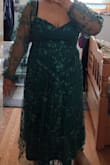 This dress was cute online but not so much in person. Material felt very thick and stiff. The embroidery is nice tho, just not what I wanted for a wedding. Dress is considered a midi but definitely might as well be a maxi on me - Janina P.