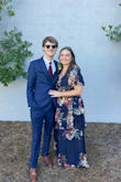 I was a little worried the dress would be too tight around the waist, but it fit perfectly! I loved the material; it was thick enough for a fall wedding but flowy when moving. It was so easy to dance in with the slit. I also loved that the front was pretty modest. I would purchase it again! - Nealey T.