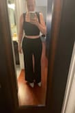 I was a little hesitant to buy this bc all the body types in reviews were so different. The top looked so good on ppl where it only showed a little stomach and on me I felt like it was a toddler's shirt. The pants barely got over my hips. In the pic, they appear to be fully on but they're fully unzipped and unbuttoned in the back. This is size large, I'm 5ft9 and 170 lbs. I usually wear large in lulus dresses. I have a pear shape and very small waist/larger hips and butt. The length of the pants was perfect though bc I have heels on and the pants were still covering them. Unfortunately, this did NOT look good on me. Bummer, it's going back. - Jessica W.