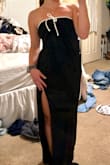 Love it! I wish I would've gotten an extra small because the material is stretchy, and I will be wearing this for a long time so I wanted it to be tight to stay up. I do have to wear 3.5-5" heels so the dress doesn't drag on the floor. The slit falls at a flattering spot nonetheless and not too high/low. For the bow, it's a little stiff and doesn't lay like the picture. - Delaney U.
