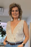 This bodysuit was way out of my comfort zone, but I loved it. It fits perfectly. I did use the double-sided clothing tape to make sure it stayed in place but was very pleased with it. - Donnie Y.